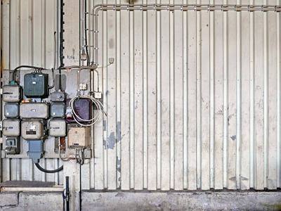 File:Distribution board and wall in workshop.jpg