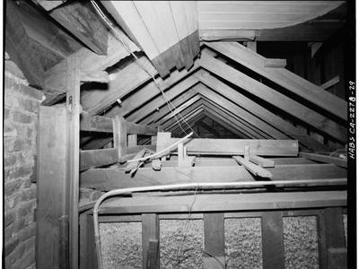 File:Attic interior showing roof truss system over waiting room; note knob-and-tube wiring system; brick section at far left is rear of tower, which of brick masonry construction HABS CAL,41-SACAR,1-29.tif