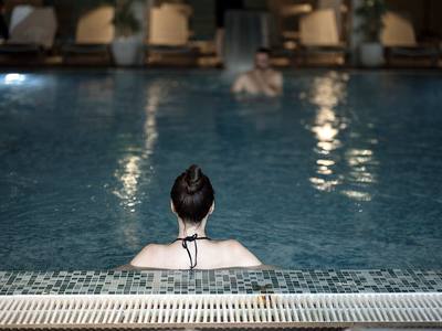 File:A person is in the water. Back view.jpg