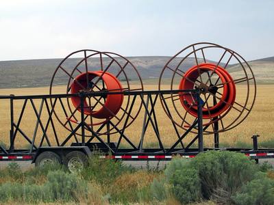 File:Laying fiber optic cable along the lonely stretch of highway between Yakima and the Vernita Bridge (9567199140).jpg