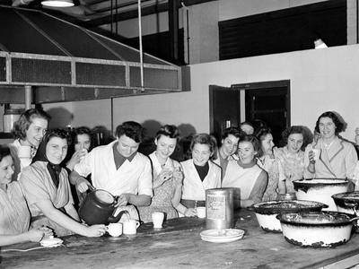 File:Catering staff have a quick cup of tea before the dinner-time rush begins at a canteen in an British aircraft factory, 1942. D11399.jpg